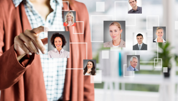 Project manager woman looks at different candidates and team members virtually using resource planning models for scrum teams