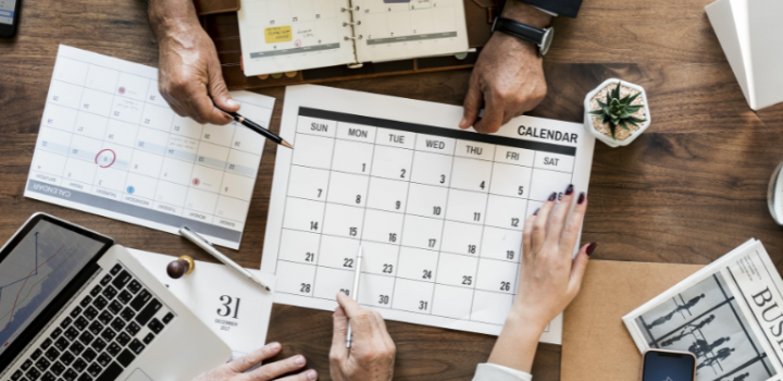 project planning adds value to your business a photo of project managers sitting around the table in the office planning a project