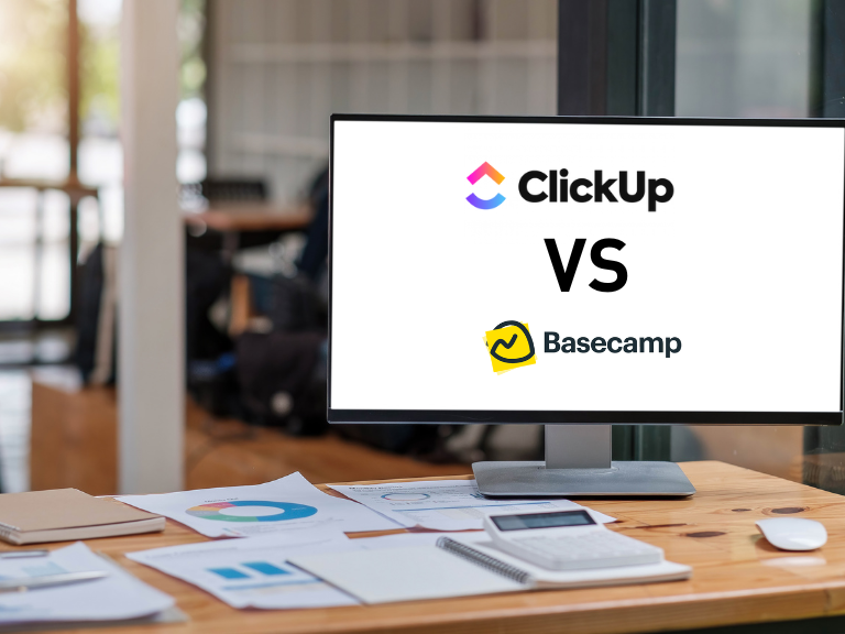 clickup vs basecamp written on a desktop computer monitor showing the comparison between the two tools
