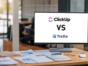 clickup vs trello comparison of two collaboration tools written on an office computer